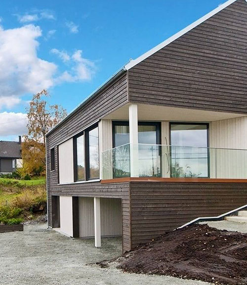 Surenkami mediniai karkasiniai skydiniai namai